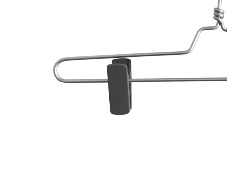 A close-up of a Hangers of London Natural Aluminium Clip Bottom Hanger 35cm with a black plastic clip attached to it. The hanger boasts a simple and minimalist design, featuring a hook on top for hanging. The background is plain white.
