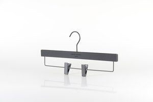 A Wooden Rubber Soft Touch Kids Bottom Harvey Nichols 32cm from Hangers of London is pictured against a white background. The hanger features two adjustable clips for securing garments, making it an excellent choice for wardrobe organization.