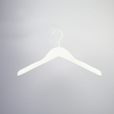 A White Wooden Jacket Top Coat Hanger 38cm from Hangers of London with a curved hook at the top is suspended against a light grey background. Ideal for wardrobe organization, this jacket & coat hanger boasts a broad, flat design suitable for hanging a variety of clothing items.
