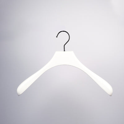 A Hangers of London White Wooden Jacket Top Coat Hanger 38cm with a black metal hook is centered against a light gray background. The hanger, similar to a top coat hanger, has a smooth, slightly curved shape designed to hold shirts, jackets, or other garments without causing wrinkles.