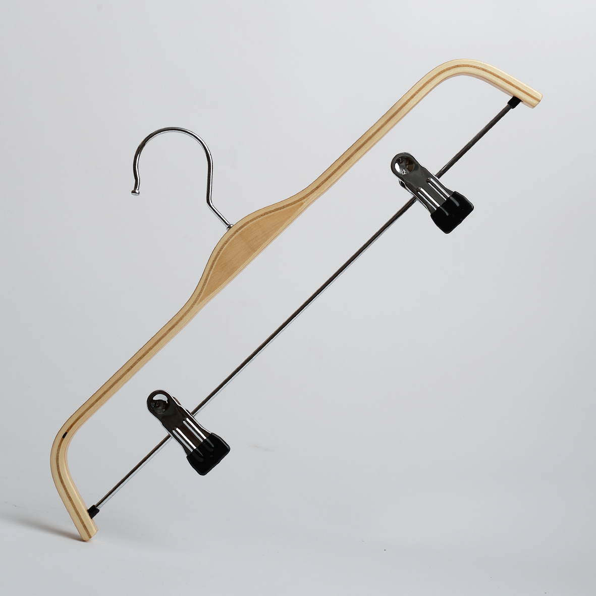 The Hangers of London Scandi Style Laminated Wooden 37cm Clip Hanger features a sturdy metal hook and two black adjustable clips, making it ideal for hanging pants or skirts. Shown here on a plain white background, this pack includes 100 hangers.