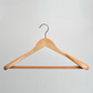 The Hangers of London Natural Wooden 45cm Jacket Hanger with Trouser Bar (Pack of 24) is displayed against a plain light gray background, featuring a sturdy wooden construction and a metal hook.