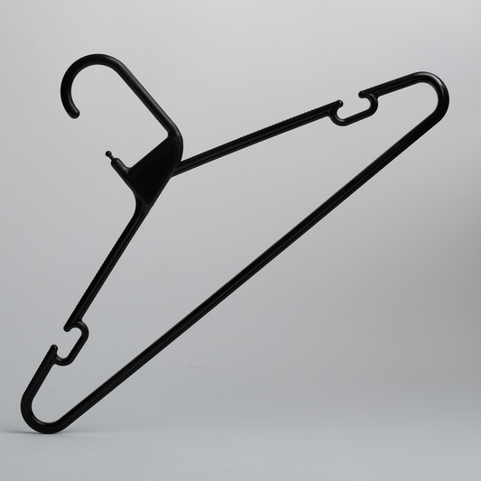 The Hangers of London Heavy Duty Economy Black Multi Purpose Rainbow Hanger is positioned upright against a plain gray background, showcasing its black plastic design with hooks on both sides.