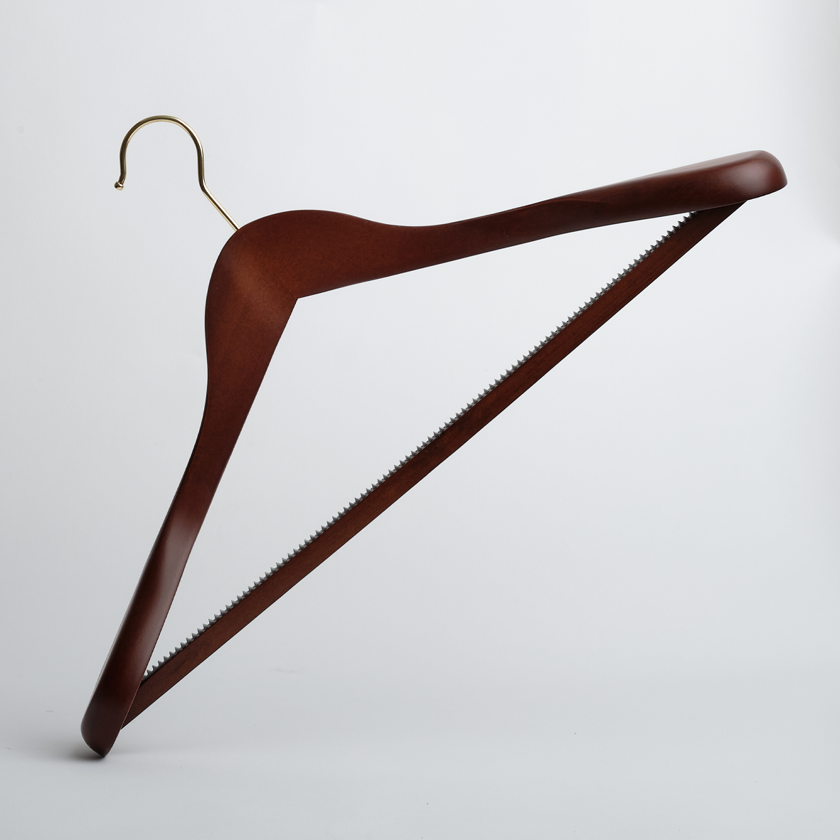 A Hangers of London Dark Wooden 45cm Jacket Hanger with a gold hook and trouser bar, featuring a unique saw-edged design in place of the standard straight bar, is displayed against a plain white background.