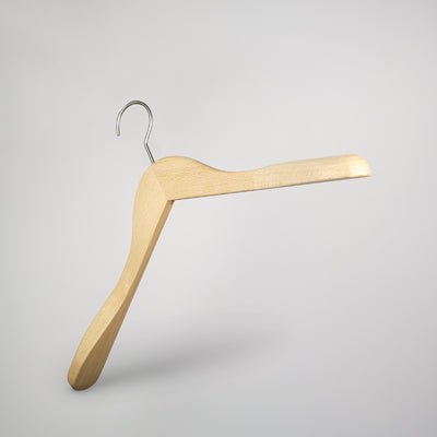 A durable wooden hanger with a metal hook is suspended against a plain white background. The Hangers of London Natural Wooden Jacket Top Coat Hanger 44cm has curved shoulders and a sturdy design, ideal for garment care and hanging various types of clothing.